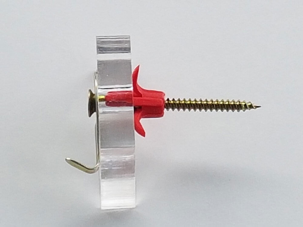 Perspex model showing section through of installed Scorpion self aligning wall plug and screw and picture hook