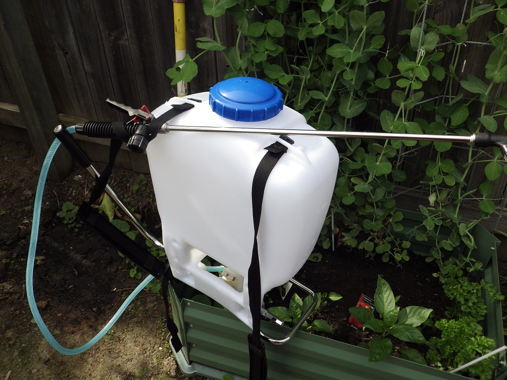 Knap Sack sprayer with rubber breather vales in lid and nylon hose tails in hose between the tank and the spray wand